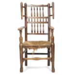 AN EARLY 19TH CENTURY LANCASHIRE / CHESHIRE STYLE ASH AND FRUITWOOD ARMCHAIR the spindle back with