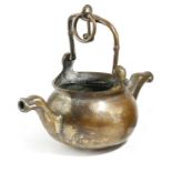 A NETHERLANDISH BRASS LAVABO PROBABLY 16TH CENTURY with a swing handle with female mask terminals