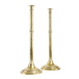 A LARGE PAIR OF GEORGE III BRASS CANDLESTICKS LATE 18TH / EARLY 19TH CENTURY each with an ejector