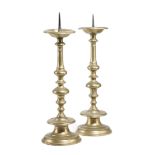 A PAIR OF FLEMISH BRASS PRICKET CANDLESTICKS LATE 17TH / EARLY 18TH CENTURY each with a dished