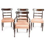 A SET OF FOUR REGENCY MAHOGANY DINING CHAIRS EARLY 19TH CENTURY each with a curved tablet top