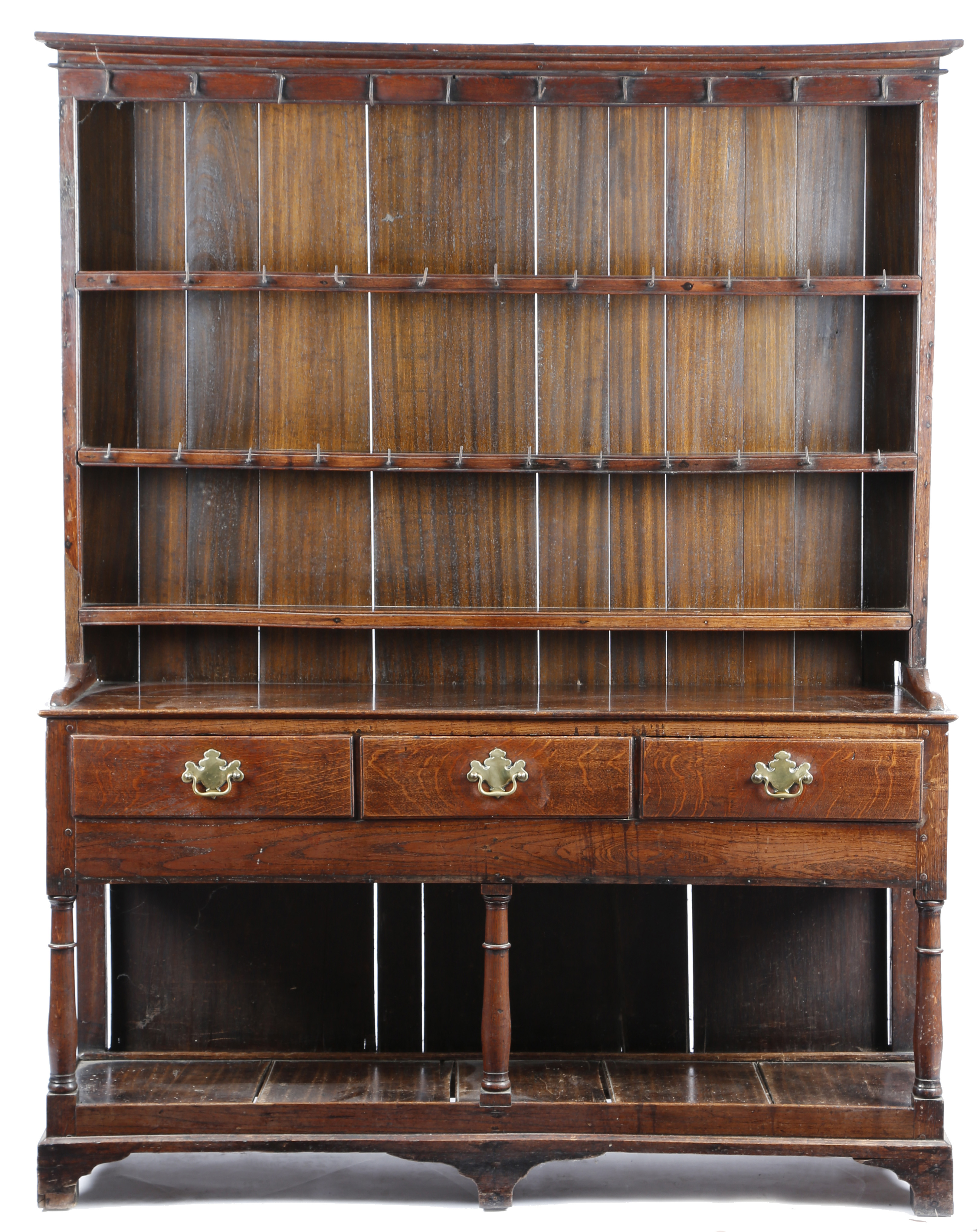 A LATE GEORGE III OAK POTBOARD DRESSER PROBABLY SOUTH WALES, EARLY 19TH CENTURY the raised plate