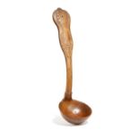 A CARVED TREEN FRUITWOOD LADLE 19TH CENTURY of king's pattern, pierced for suspension 29.5cm long