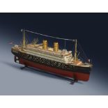 A RARE GERMAN TINPLATE DISPLAY-MODEL OF AN OCEAN LINER BY MARKLIN c.1912-18 of a twin-funnel liner