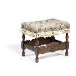 A WALNUT STOOL IN WILLIAM AND MARY STYLE LATE 19TH CENTURY the Bargello style needlework seat