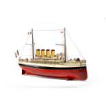 A GERMAN TINPLATE CLOCKWORK MODEL OF AN OCEAN LINER BY CARETTE c.1912-14 with a red and black