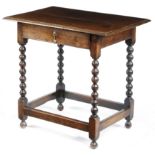 A WILLIAM AND MARY OAK SIDE TABLE LATE 17TH / EARLY 18TH CENTURY the boarded top with a moulded edge