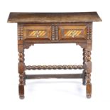 AN OAK SIDE TABLE LATE 17TH CENTURY AND LATER the single piece top above a frieze drawer with