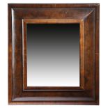 A WILLIAM AND MARY WALNUT AND OYSTER VENEERED CUSHION FRAME WALL MIRROR LATE 17TH / EARLY 18TH