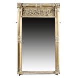 A GEORGE IV GILTWOOD PIER MIRROR EARLY 19TH CENTURY the later rectangular plate within a lappet