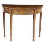 A GEORGE III MAHOGANY DEMI-LUNE CARD TABLE c.1790-1800 inlaid with boxwood stringing, the