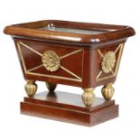 A REGENCY MAHOGANY WINE COOLER EARLY 19TH CENTURY with parcel gilt decoration, the roll-over rim