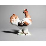 A Meissen model of a chicken, modern, standing with neck arched slightly back and head turned, an