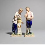 A pair of Derby figures of a gardener and his companion, 2nd half 19th century, he leaning on his