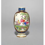A Worcester tea canister, c.1760-70, of ovoid form, painted with exotic birds strutting and in