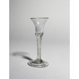 A wine glass, c.1750-60, the bell-shaped bowl raised on an airtwist stem above a folded foot, 17.