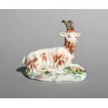 A Derby figure of a billy goat, c.1760-65, recumbent with his left foreleg outstretched, his