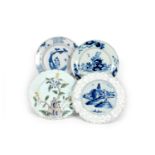Four delftware plates, mid 18th century, one Bristol and painted with a fisherman in a typical