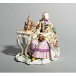 A Meissen figure of a lady at repose, mid 18th century, modelled by J. J. Kändler with a lady