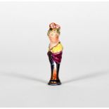 A Derby pipe tamper, .1770, modelled as the head and shoulders of a lady with feathered headdress,