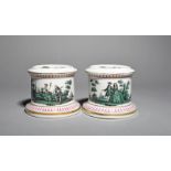 A pair of German porcelain figure or vase stands, late 18th/19th century, possibly Meissen, of