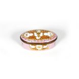 A South Staffordshire oval snuff box, c.1770, decorated with unusual gilt motifs of fruit and leaves