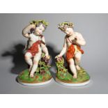 A large pair of Continental porcelain figures of putti, 19th century, possibly emblematic of