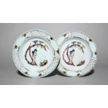 A pair of Lambeth delftware plates, c.1750-60, each painted with a Chinese lady holding a fan and