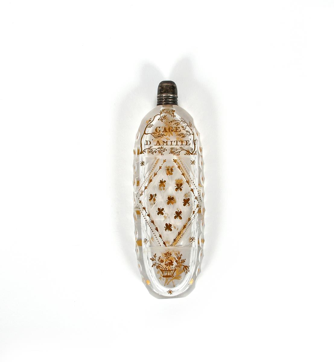 A glass cut glass scent bottle, late 18th century, of flattened oval form, gilded probably in the