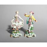 A pair of Bow figures of dancers, c.1760-65, he with his arms outstretched and stepping forward with
