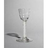 A small Lynn wine glass, c.1760, the rounded funnel bowl moulded with horizontal ribs and raised