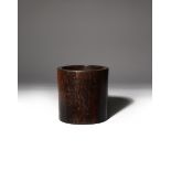 A CHINESE ZITAN BRUSHPOT, BITONG 17TH/18TH CENTURY The thick cylindrical body with a smooth polished