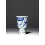 A SMALL CHINESE BLUE AND WHITE STEM CUP TRANSITIONAL C.1640 The deep U-shaped body raised on a