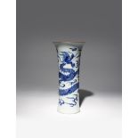 A CHINESE BLUE AND WHITE 'DRAGON' SLEEVE VASE SHUNZHI 1644-61 The cylindrical body flaring towards