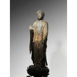 A JAPANESE LACQUERED WOOD FIGURE OF AMIDA NYORAI (AMIDA BUDDHA) MUROMACHI PERIOD OR LATER, 16TH