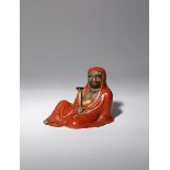 A JAPANESE KUTANI FIGURE OF DARUMA, OKIMONO MEIJI PERIOD OR LATER, 19TH OR 20TH CENTURY The