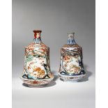 TWO JAPANESE IMARI SAKE BOTTLES, TOKKURI EDO PERIOD, 18TH OR 19TH CENTURY Both mallet-shaped, raised