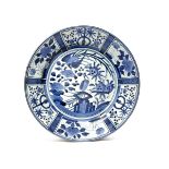A LARGE JAPANESE ARITA BLUE AND WHITE DISH EDO PERIOD, CIRCA 1700 Decorated in kraak style with