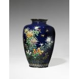 A JAPANESE CLOISONNE ENAMEL BALUSTER VASE MEIJI PERIOD, 19TH CENTURY The ovoid body decorated with