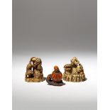 THREE JAPANESE IVORY NETSUKE EDO PERIOD AND LATER, 18TH AND 19TH CENTURY One depicting a tiger and a