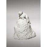 A JAPANESE WHITE GLAZED MODEL OF A SQUIRREL, OKIMONO EDO PERIOD OR LATER, 19TH CENTURY Possibly