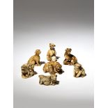 SEVEN JAPANESE IVORY NETSUKE OF DOGS EDO PERIOD AND LATER, 18TH AND 19TH CENTURY Depicted in a