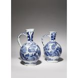 TWO JAPANESE ARITA BLUE AND WHITE EWERS EDO PERIOD, 17TH CENTURY Of ovoid form with a tall neck,