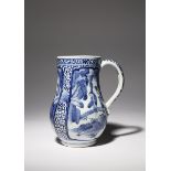 A JAPANESE ARITA BLUE AND WHITE MUG EDO PERIOD, 17TH CENTURY Of typical form, the body decorated
