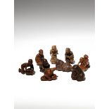 NINE JAPANESE WOOD NETSUKE OF FIGURES MEIJI PERIOD, 19TH CENTURY Variously carved as two drunk shojo