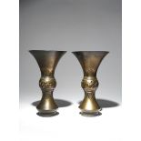 A PAIR OF JAPANESE INLAID BRONZE VASES MEIJI PERIOD, 19TH CENTURY The middle section of the