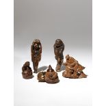 FOUR JAPANESE WOOD NETSUKE OF FIGURES EDO PERIOD AND LATER, 18TH CENTURY AND LATER One depicting a