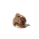 A JAPANESE IVORY NETSUKE OF RATS EDO OR MEIJI PERIOD, 19TH CENTURY Depicting a large rat and its two