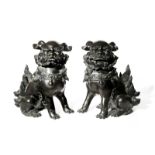 A PAIR OF LARGE JAPANESE BRONZE SHISHI, OKIMONO MEIJI PERIOD, 19TH OR 20TH CENTURY The lion dogs