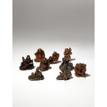 NINE JAPANESE WOOD NETSUKE OF LEGENDARY FIGURES EDO PERIOD AND LATER, 18TH CENTURY AND LATER